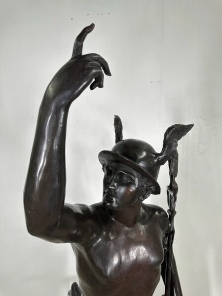Roman god Mercury, known as the messenger of the gods and the patron of commerce, travel, and communication